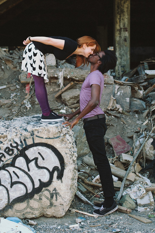 Graffiti engagement photos in an abandoned building