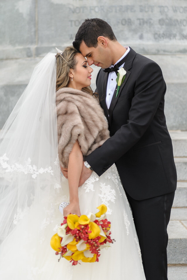 Wedding portrait at the Sir Georges Etienne Cartier statue at Mount Royal