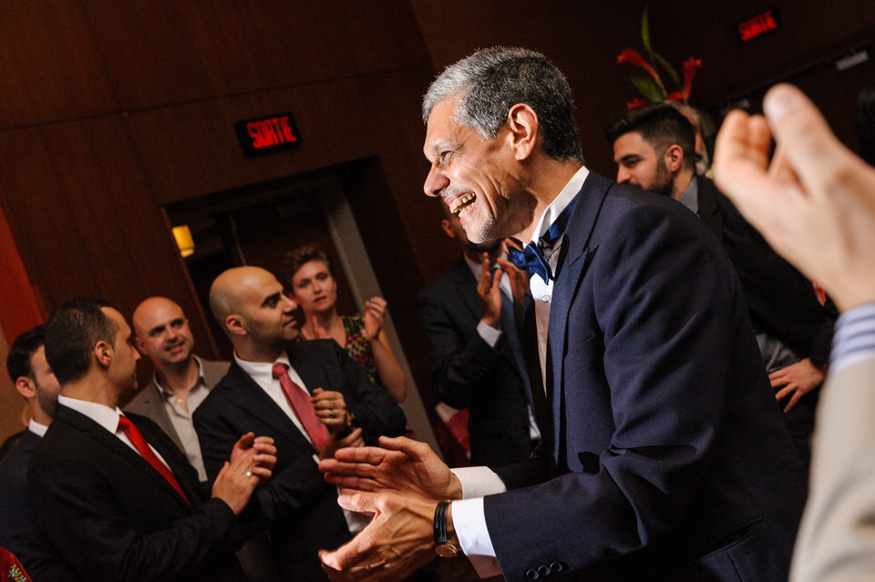 Groom's dad clapping