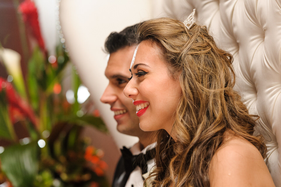Wedding couple listening to speeches