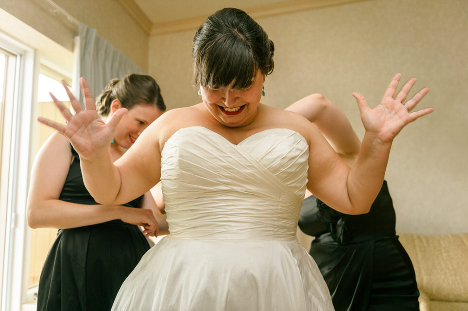 Excited bride in her wedding dress