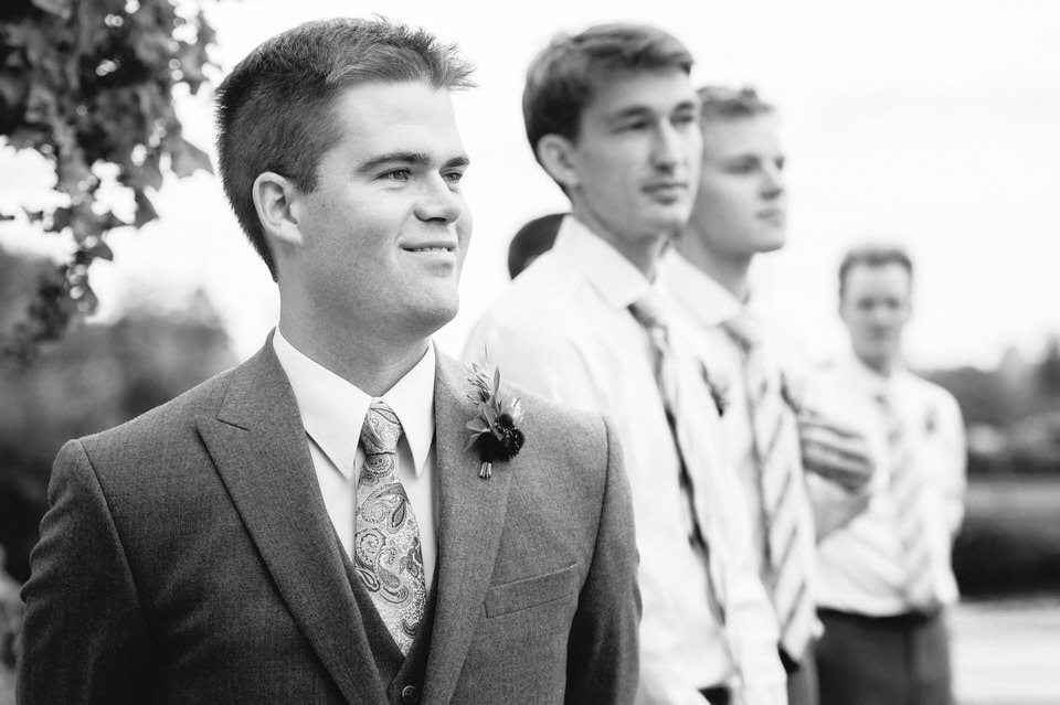 Groom waiting for bride to arrive at ceremony