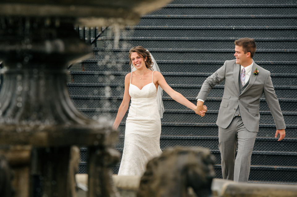 Emotional entrance of bride and groom holding hands