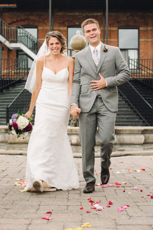 Wedding couple walk into the ceremony together