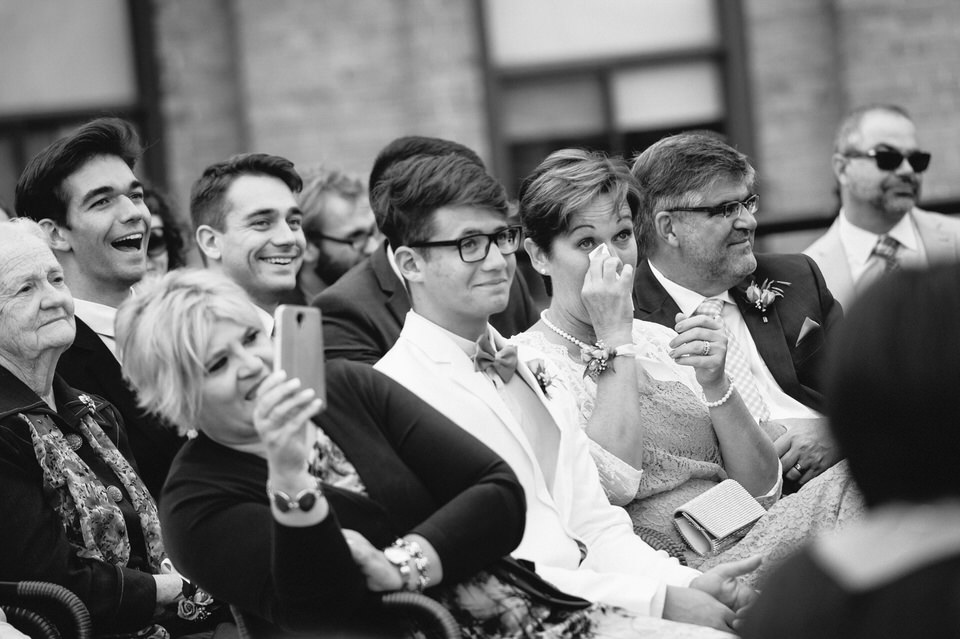 Family and guests emotional at wedding ceremony