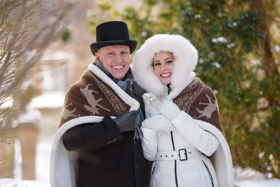 Winter wedding portraits with blanket outdoors