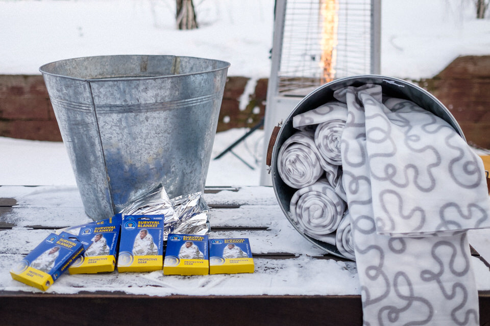 Survival blankets and wraps for outdoors wedding ceremony