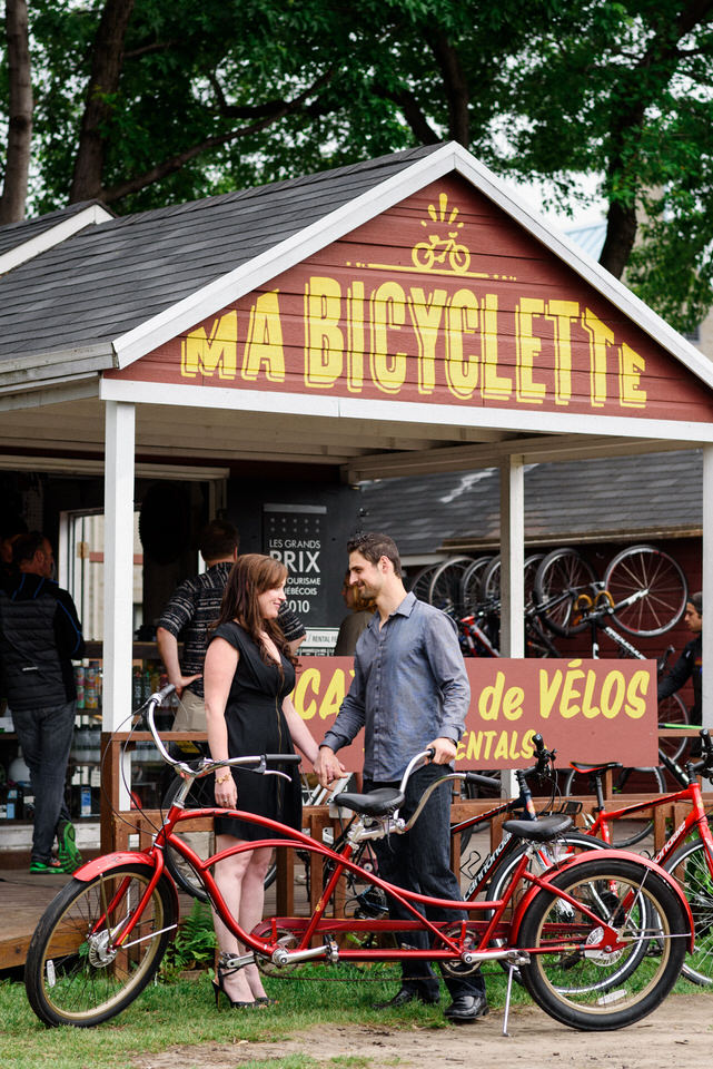 Couple standing in front of Ma Bicyclette bike rental shop