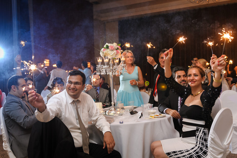 Guests holding sparklers during first dance