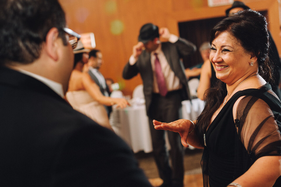 Woman smiling at groom