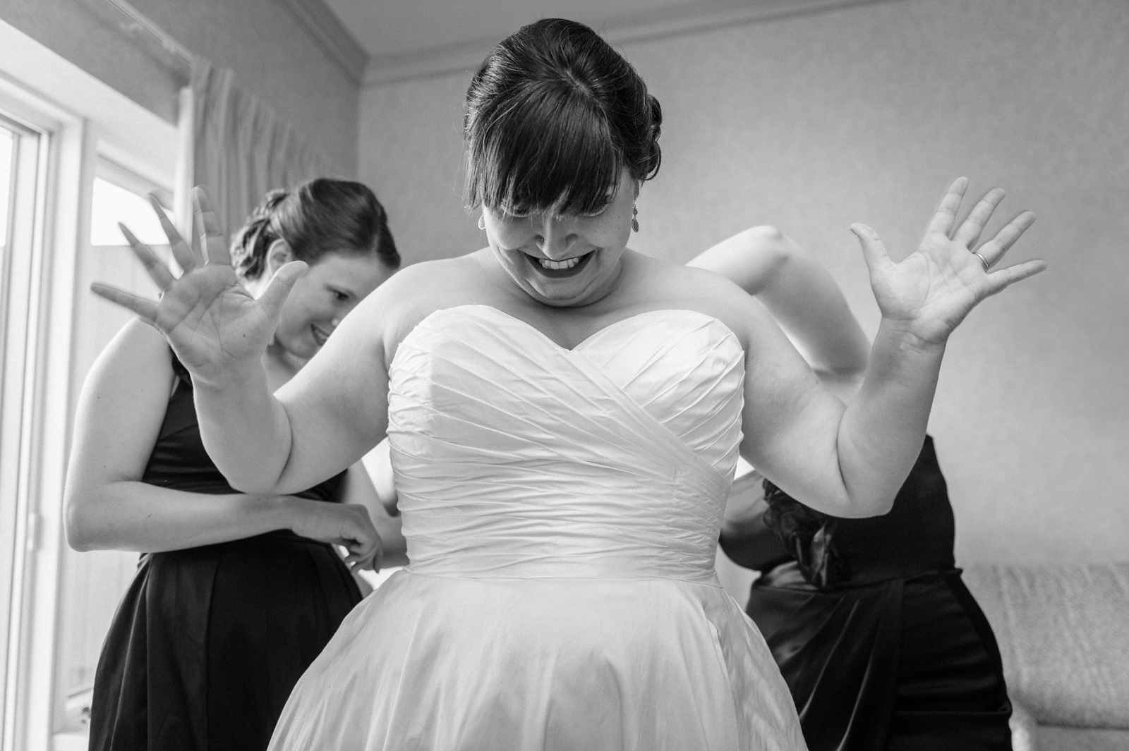 Excited bride with wide open hands