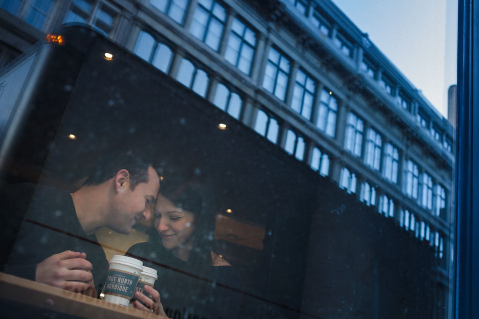 Couple warming up in a coffee shop