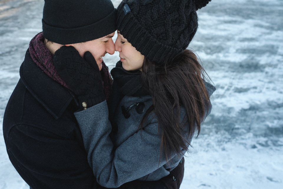 couple cuddling in the winter