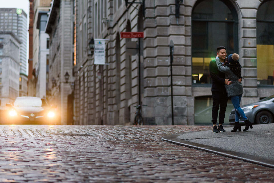 Couple walking along in Old Montreal