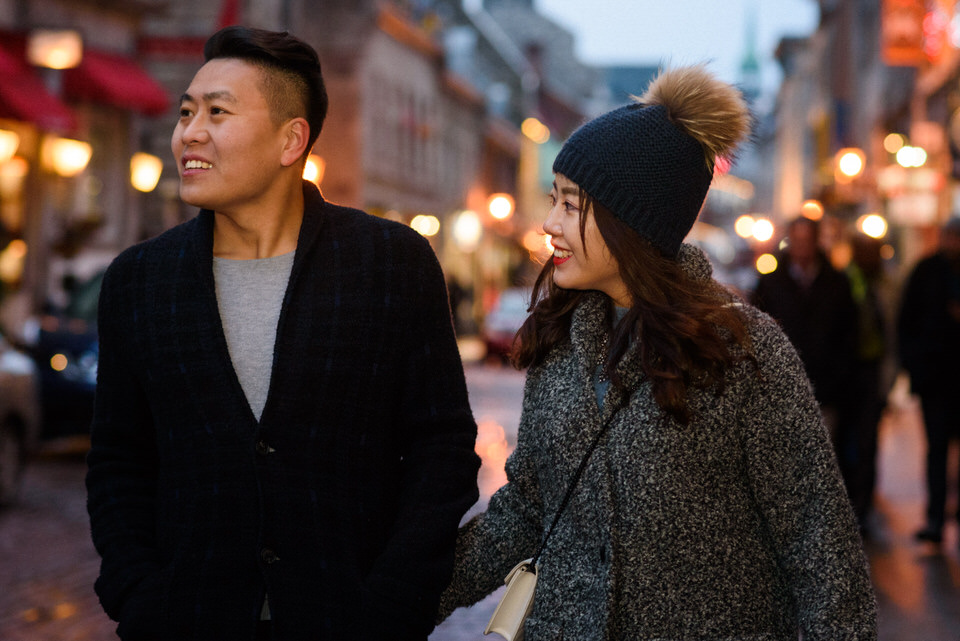 Man and woman strolling in Old Montreal in winter