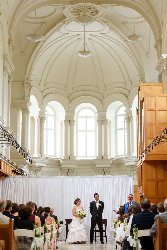 Abbaye d'Oka wedding ceremony with beautiful arching ceiling