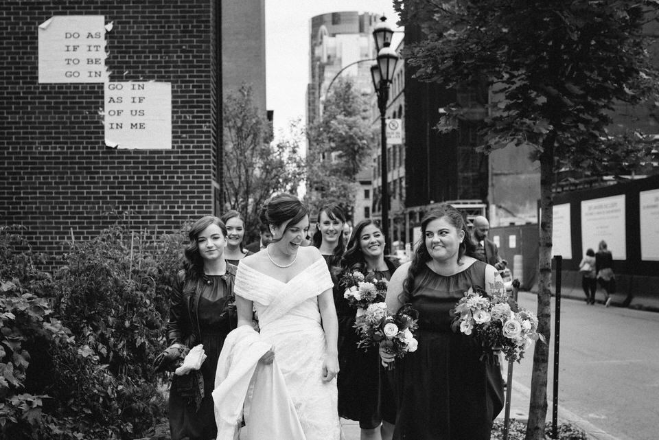 Bridesmaids walking together in downtown Montreal