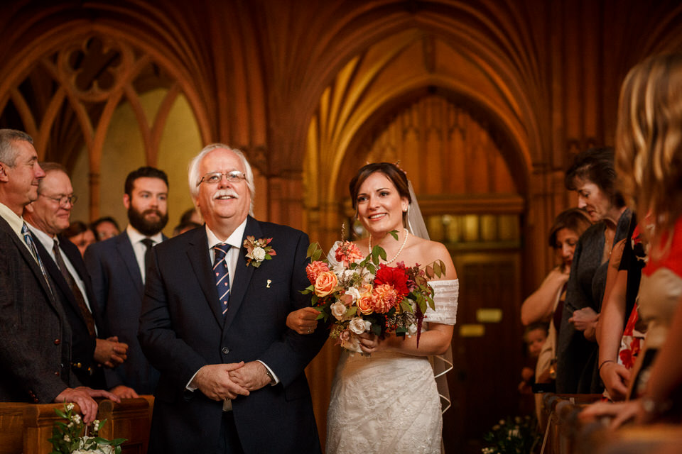 Bride and father walking down the aisle 