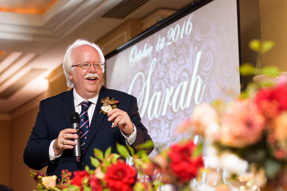 Bride's father giving speech during the reception