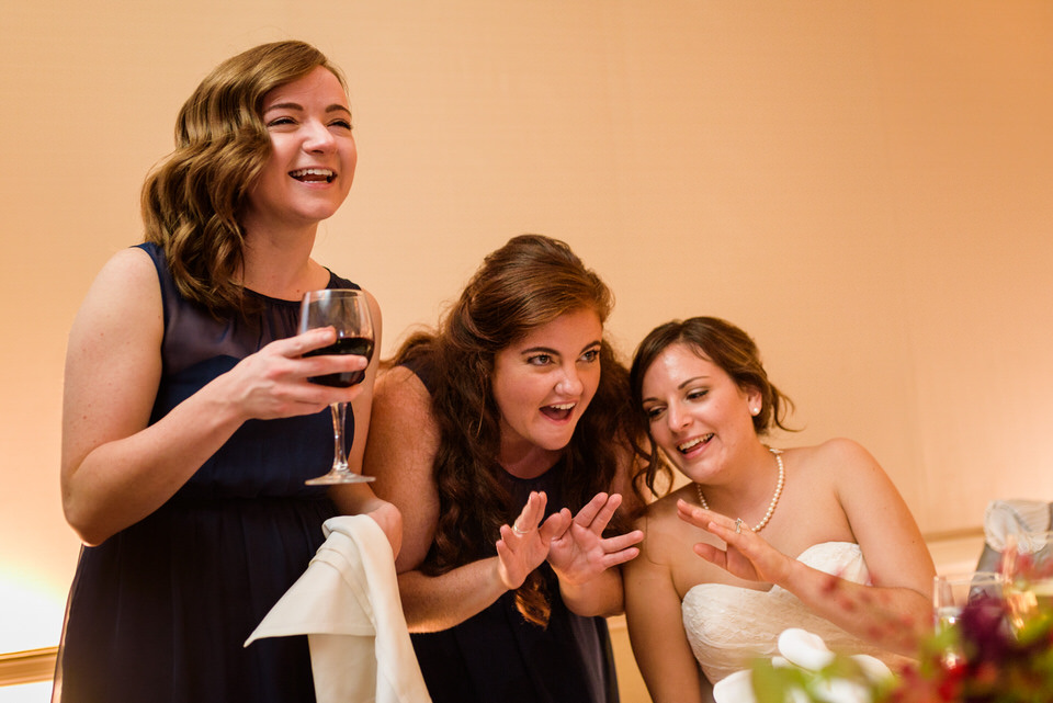 Guest and bride talking during the reception