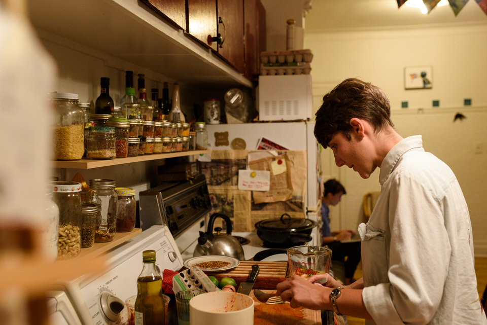 Casual engagement photos while cooking at home 01