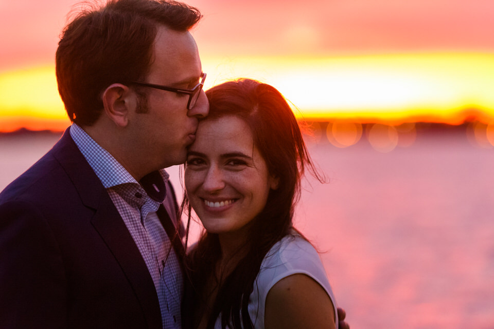 Newly engaged couple after sunset proposal