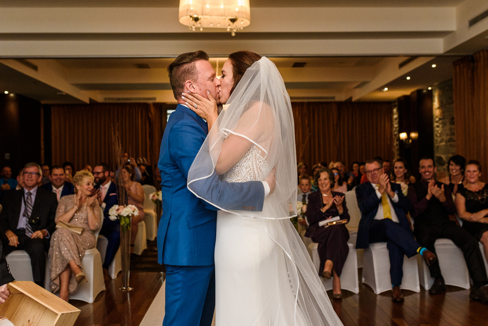 First kiss at wedding ceremony at Hotel Nelligan