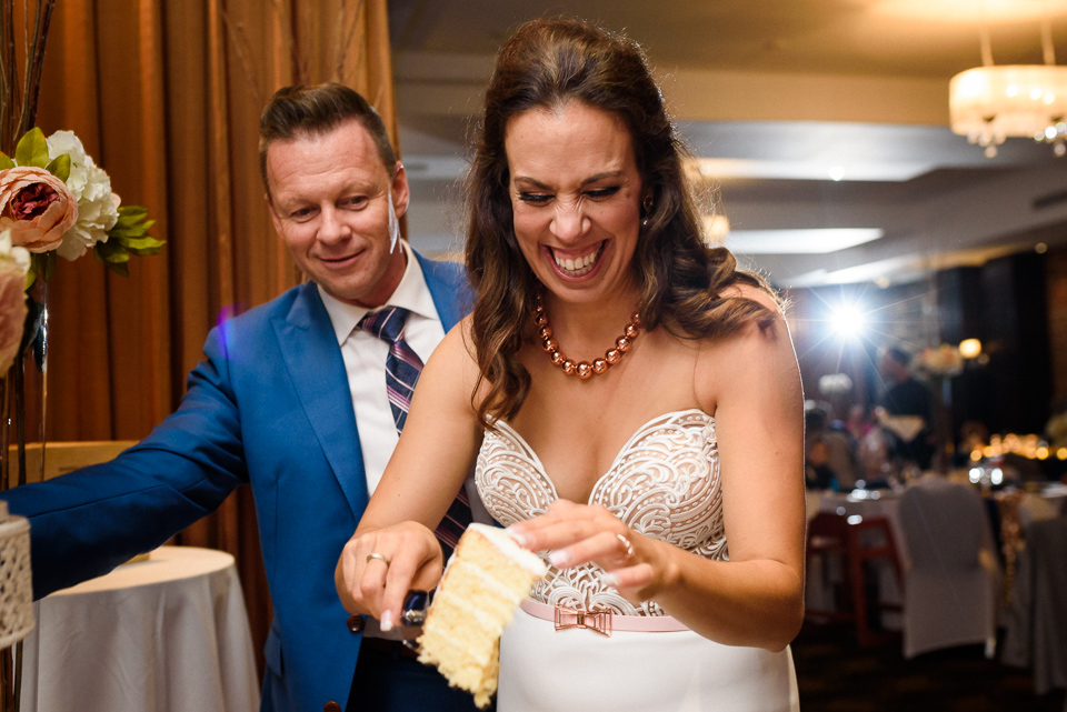 Bride cutting the cake