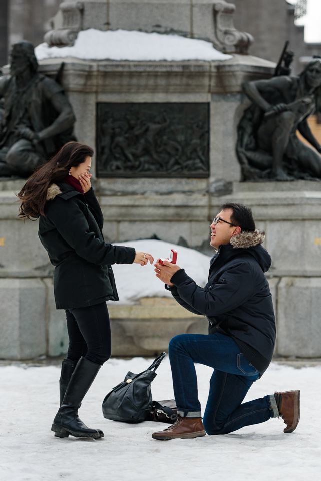 Surprise proposal in Place d'Armes Montreal