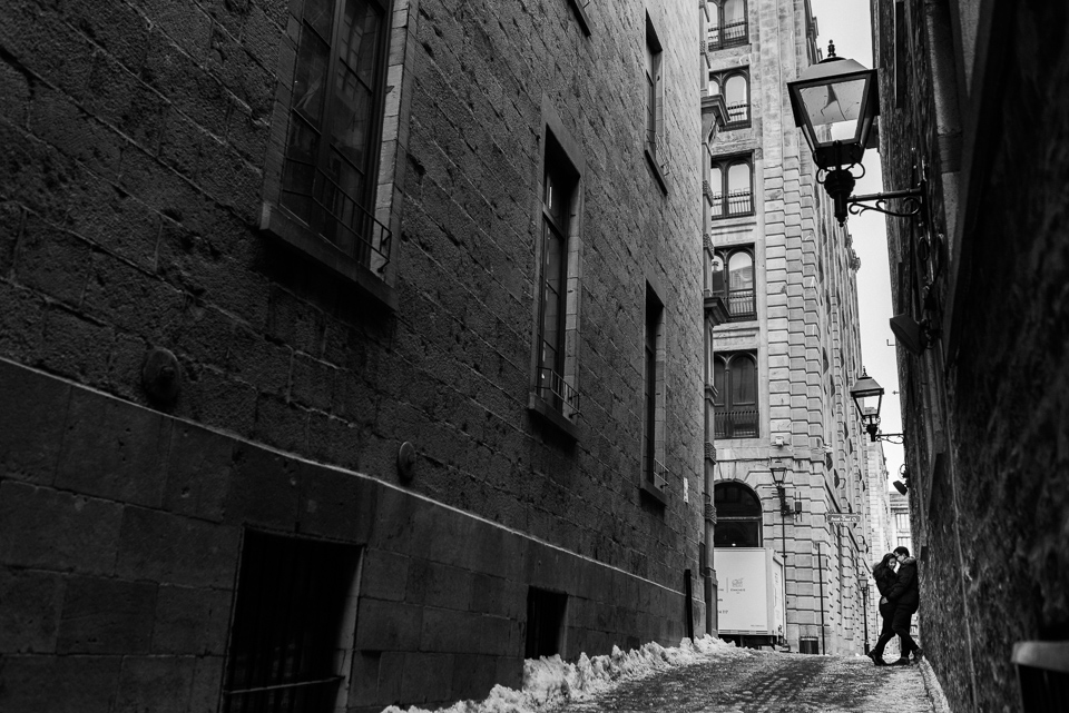 Romantic engagement photo in Old Montreal alleyway