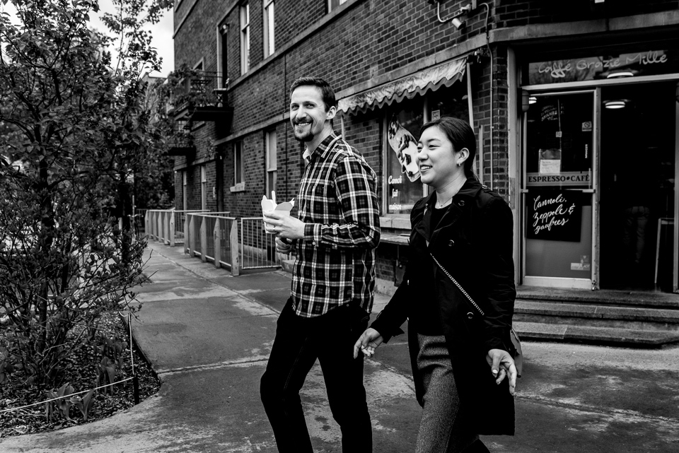 Couple vacation photoshoot in Montreal with snacks in Mile-End
