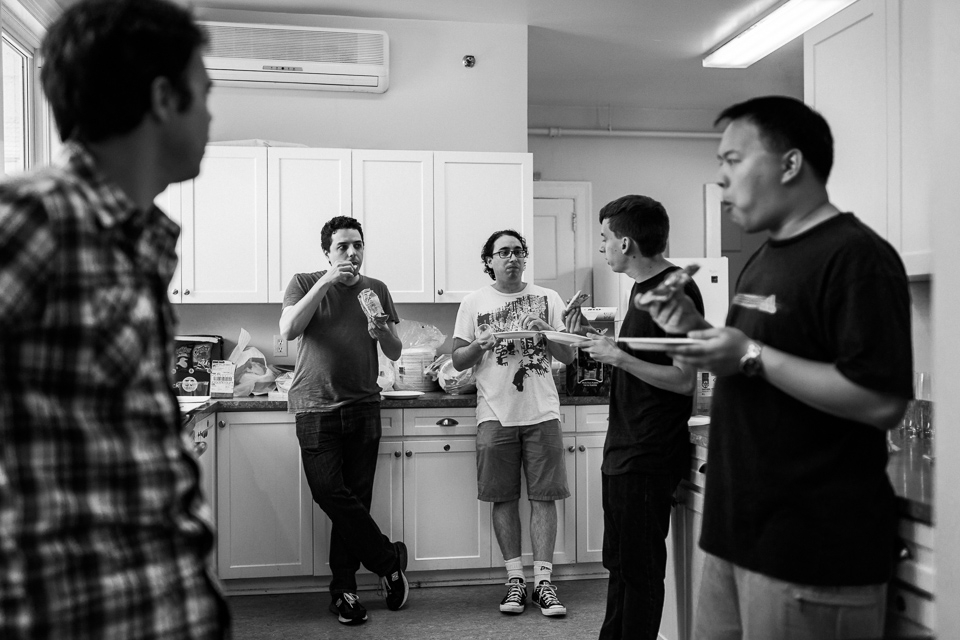 groomsmen hanging out in the kitch