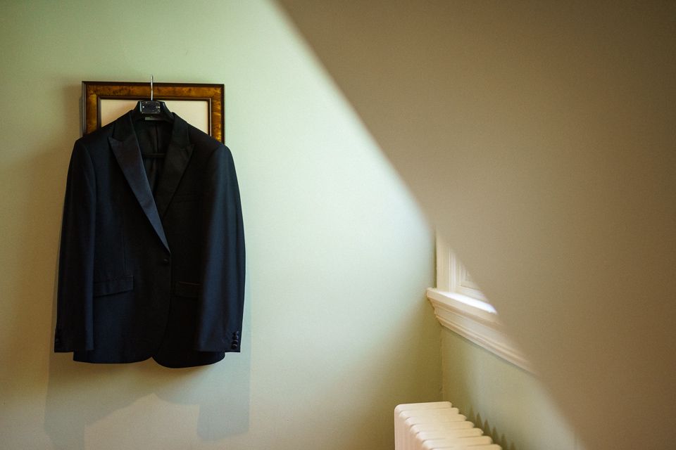 Suit hanging on mirror