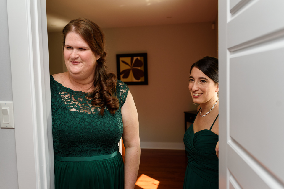 Friends watching bride get ready