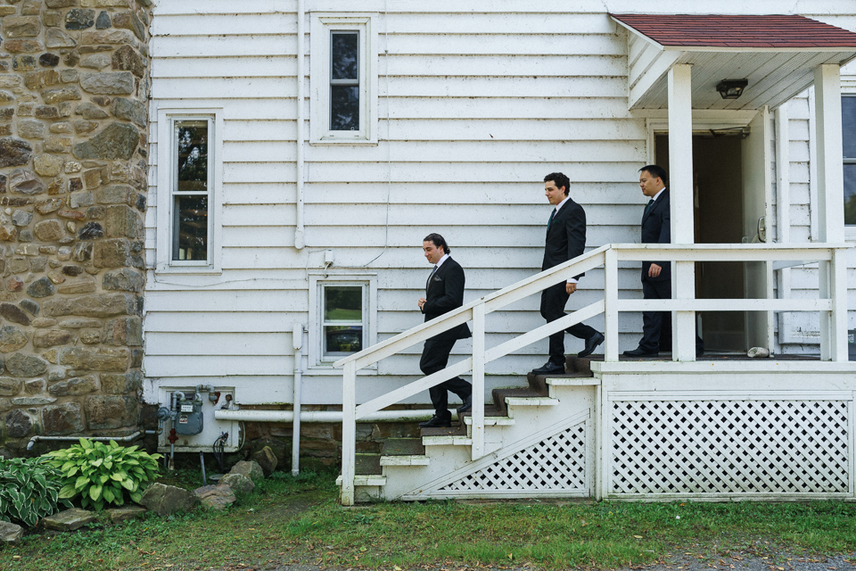 Groomsmen descending stairs