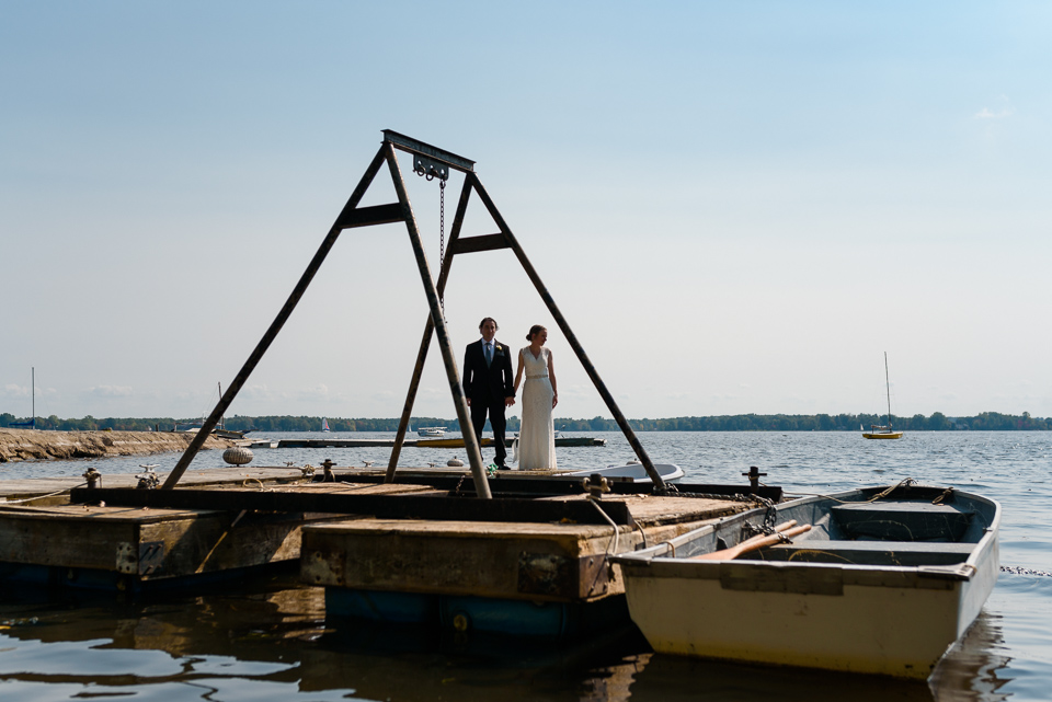 Wedding on a dock framed by structure