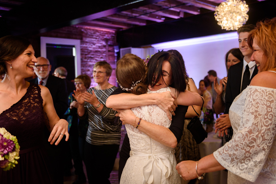 Hugs at arrival of bride and groom