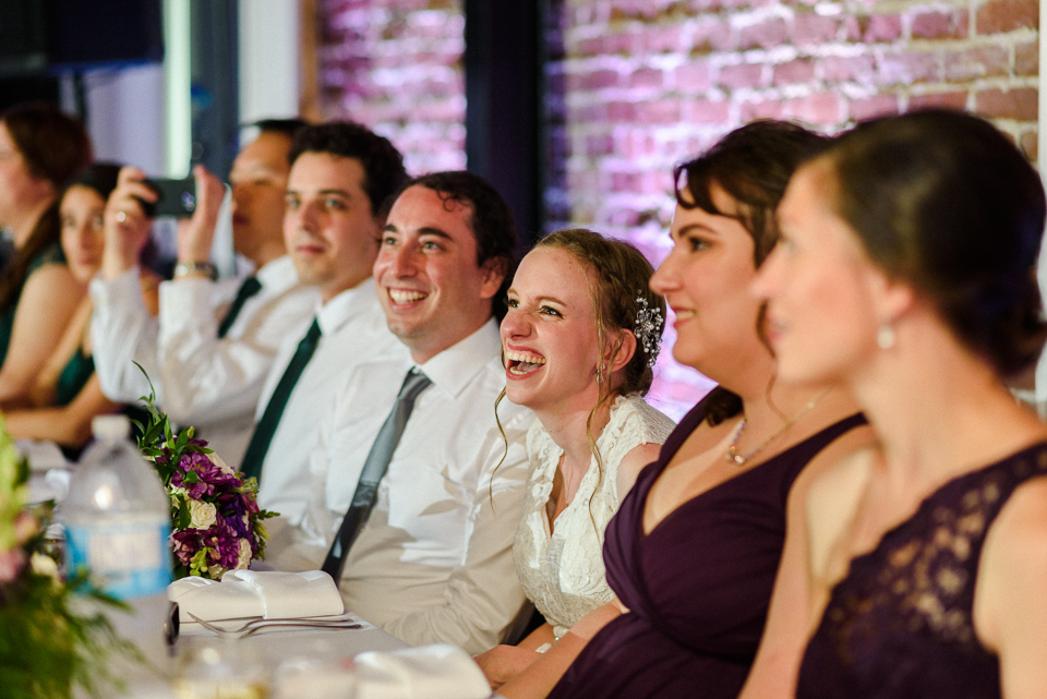 Wedding party sitting down at dinner