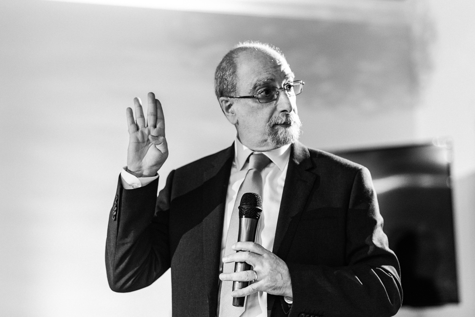 Father of groom giving speech and raising Star Trek hand sign