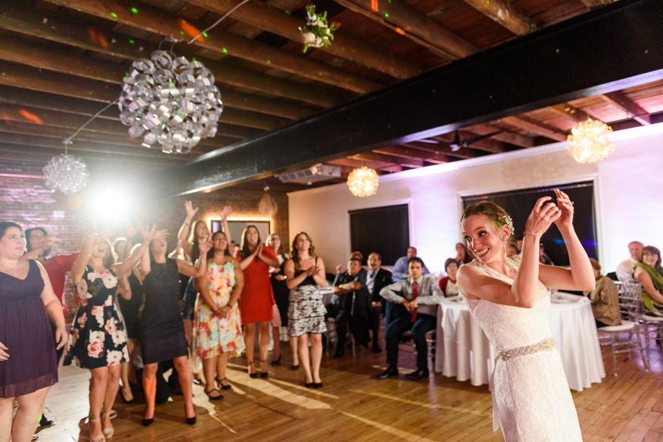 Bride throwing bouquet