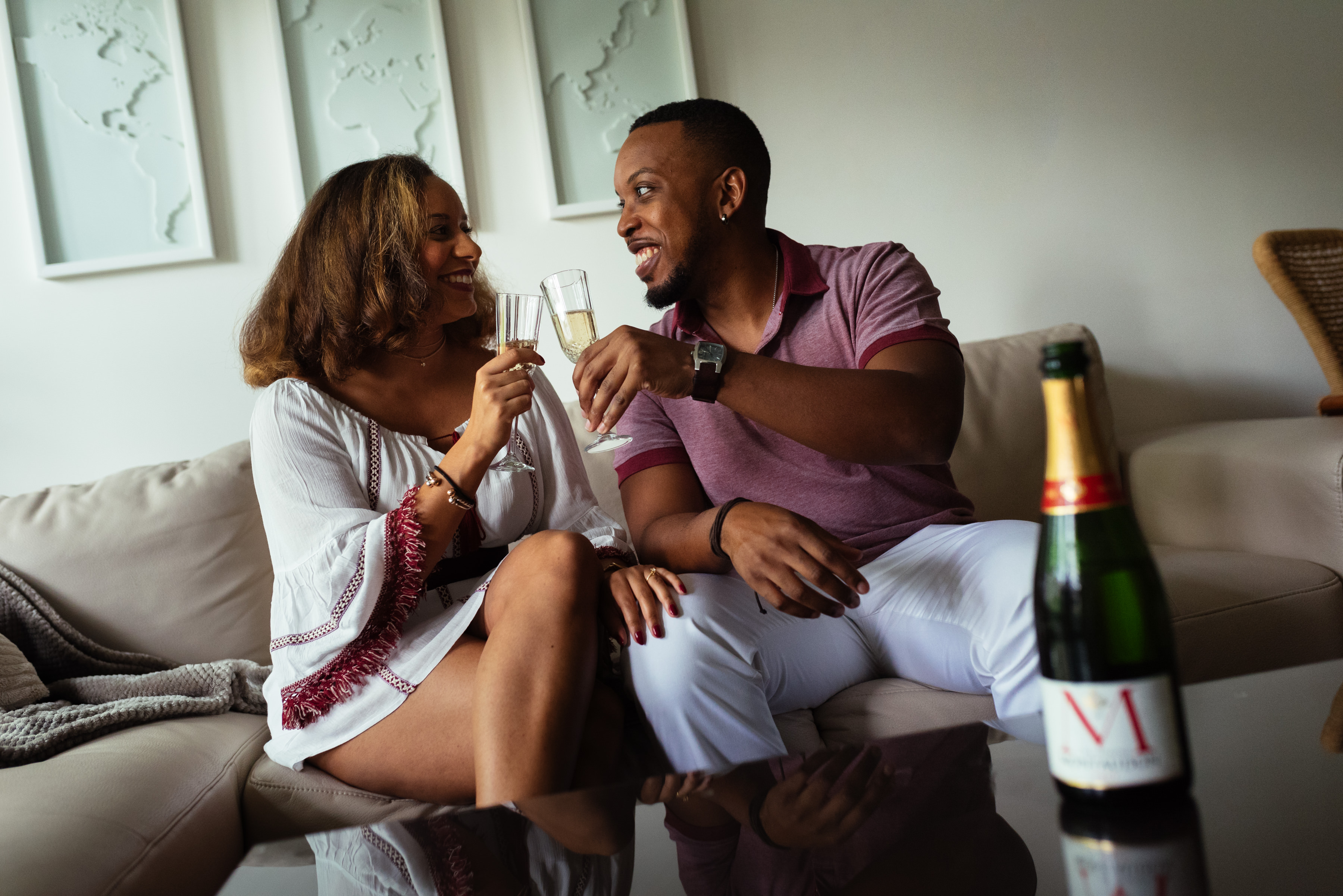 Engagement photos at home with champagne