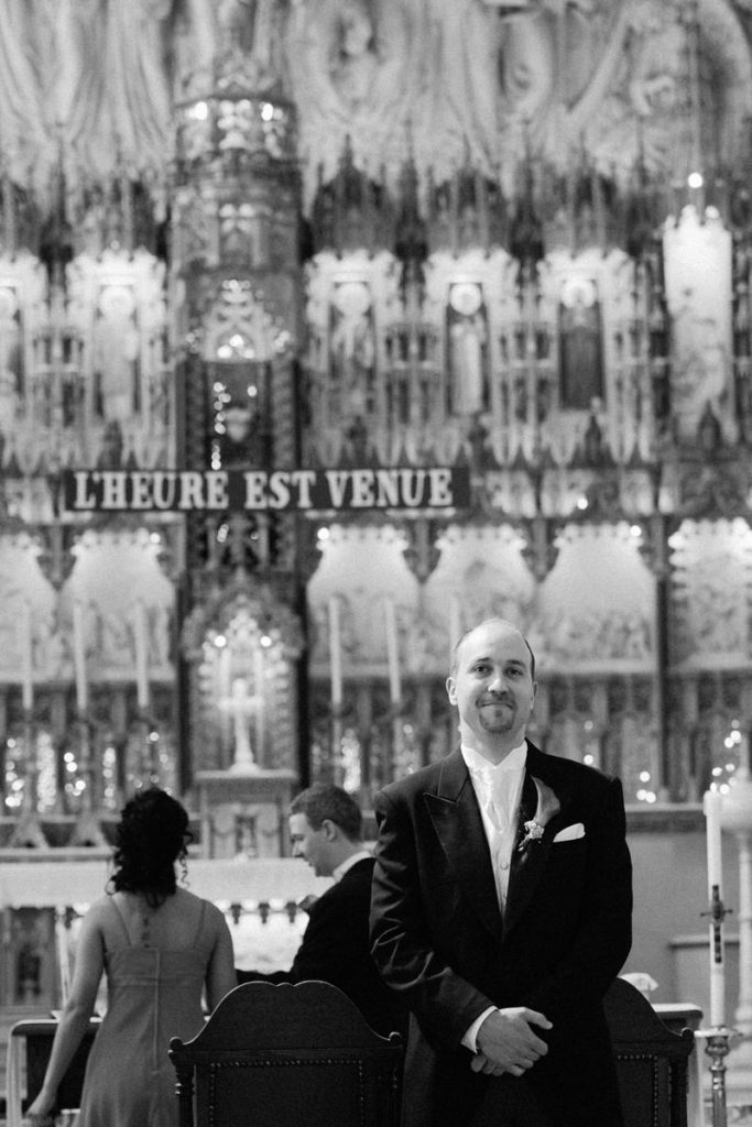 Groom standing at front of church