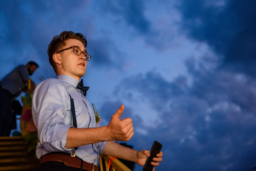 Groom's son giving a speech at night