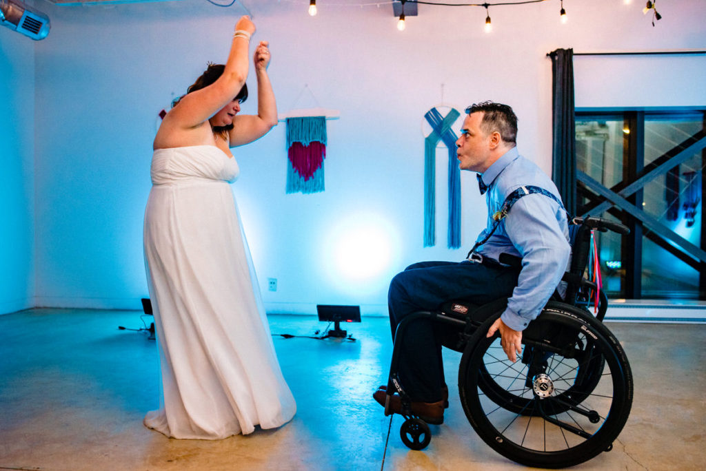 Wedding couple doing the fish catching dance