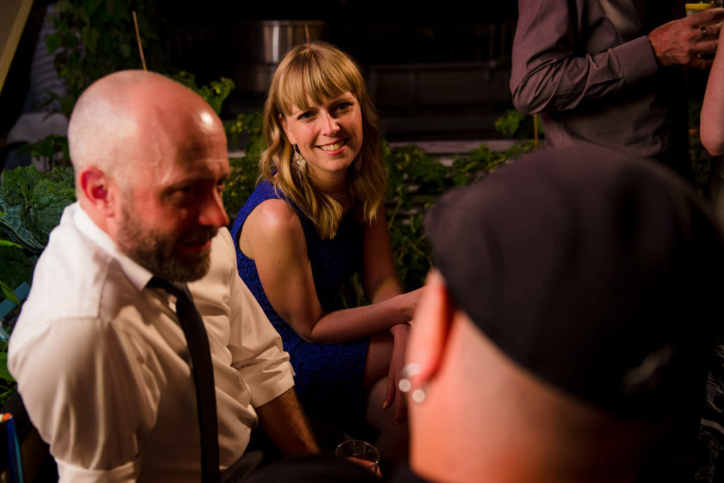 Wedding guests chatting at night