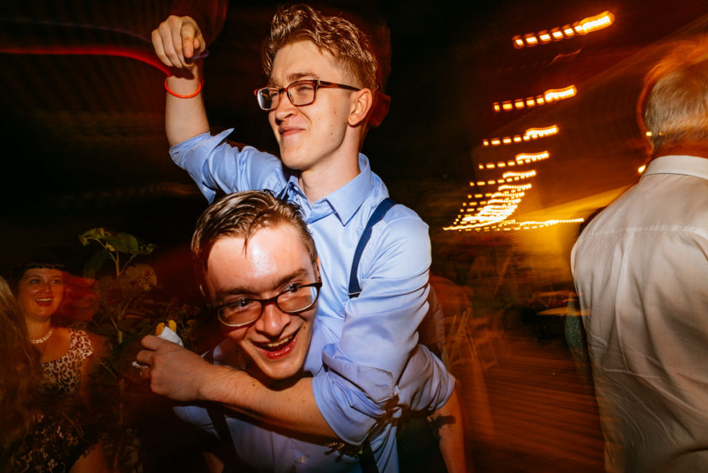 Groom's sons dancing at wedding reception