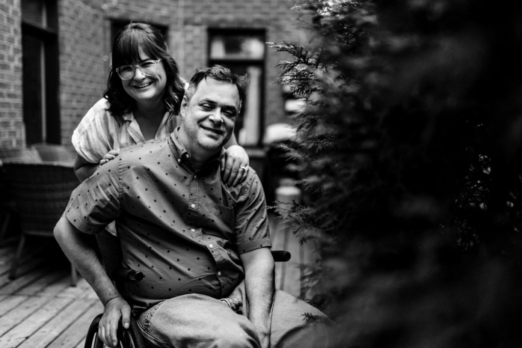 Portrait of engaged couple in their backyard