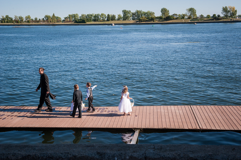 Ringbearer and flower girls on dock near La Vieille Brasserie de Lachine