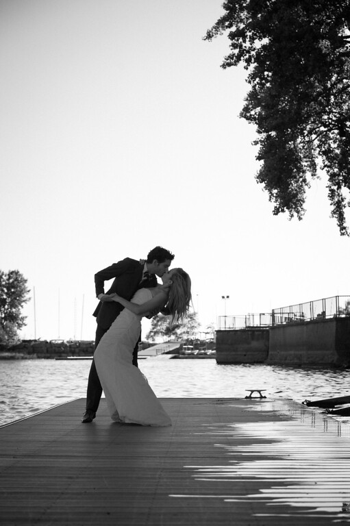 Wedding couple on dock along St Lawrence River