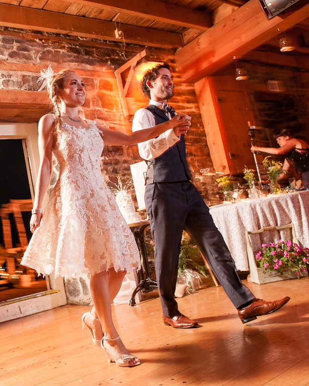 Bride and groom entering La Vieille Brasserie wedding venue